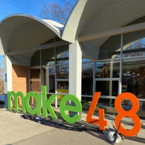 A picture of Brighton Makerspace on KSSB Campus with large Make48 letters out front